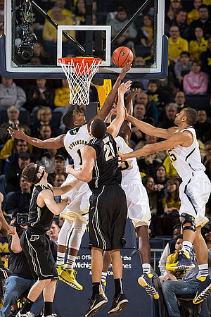 Glenn Robinson III (1), Caris LeVert (23), and Jon Horford (15)