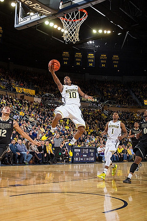 Derrick Walton Jr. (10) and Glenn Robinson III (1)
