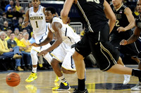 Glenn Robinson III (1) and Derrick Walton Jr. (10)