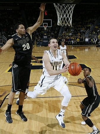 Nik Stauskas (11) and Glenn Robinson III (1)