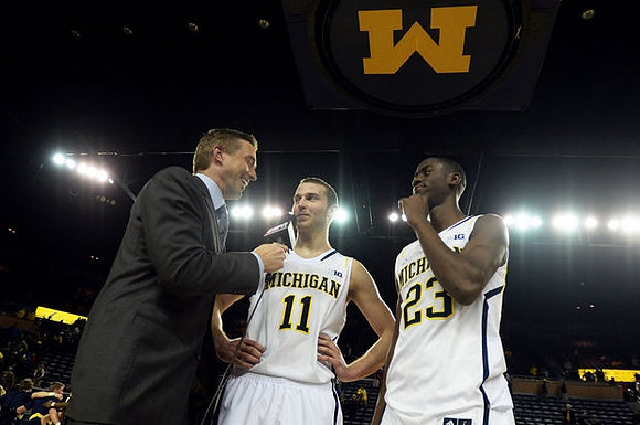 Nik Stauskas (11) and Caris LeVert (23)