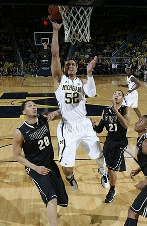 Jordan Morgan (52) and Caris LeVert (23)