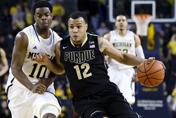Derrick Walton Jr. (10) and Jordan Morgan (52)