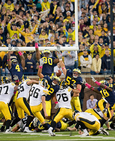 Cameron Gordon (4), Martell Webb (80), Greg Banks (92), Ryan Van Bergen (53), and James Rogers (18)