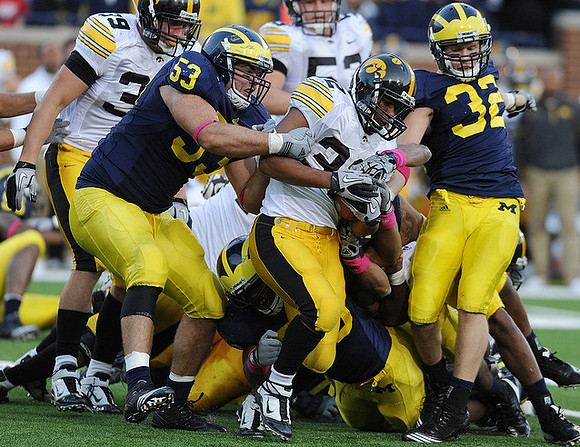 Ryan Van Bergen (53), Greg Banks (92), and Jordan Kovacs (32)