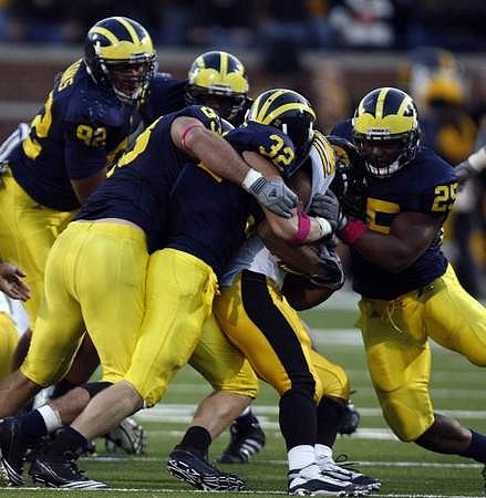 Greg Banks (92), Ryan Van Bergen (53), Jordan Kovacs (32), and Kenny Demens (25)