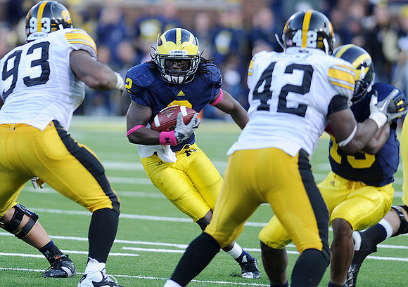 Vincent Smith (2) and Kelvin Grady (19)