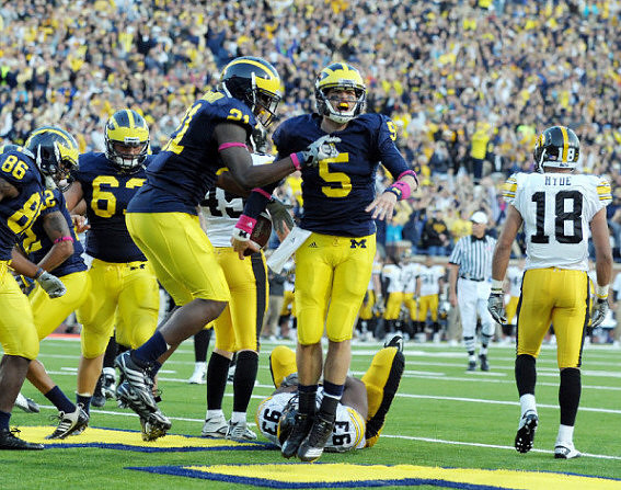 Kevin Koger (86), Rocko Khoury (63), Junior Hemingway (21), and Tate Forcier (5)
