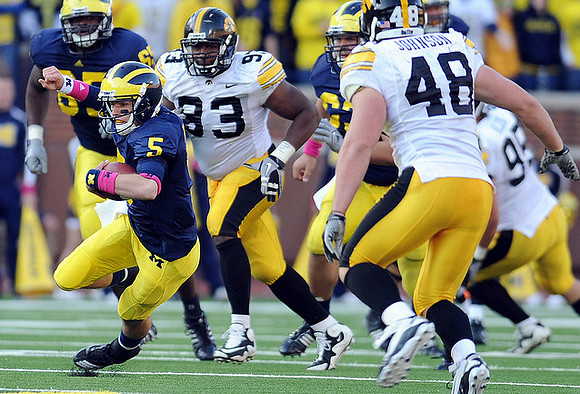Patrick Omameh (65), Tate Forcier (5), and Rocko Khoury (63)