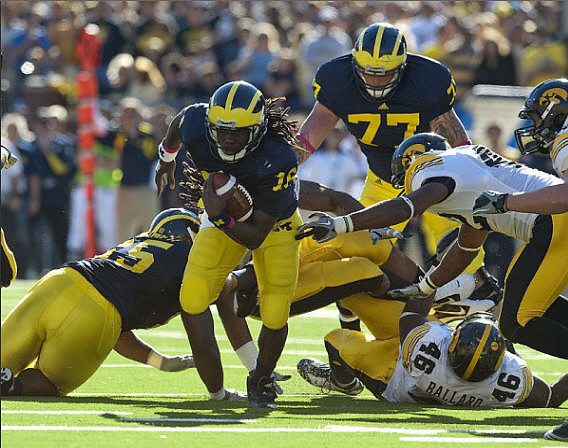 Patrick Omameh (65), Denard Robinson (16), and Taylor Lewan (77)