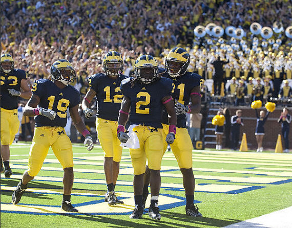 Rocko Khoury (63), Kelvin Grady (19), Roy Roundtree (12), Vincent Smith (2), and Junior Hemingway (21)