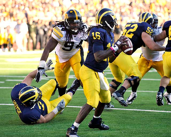 Mark Huyge (72), Denard Robinson (16), and Stephen Schilling (52)