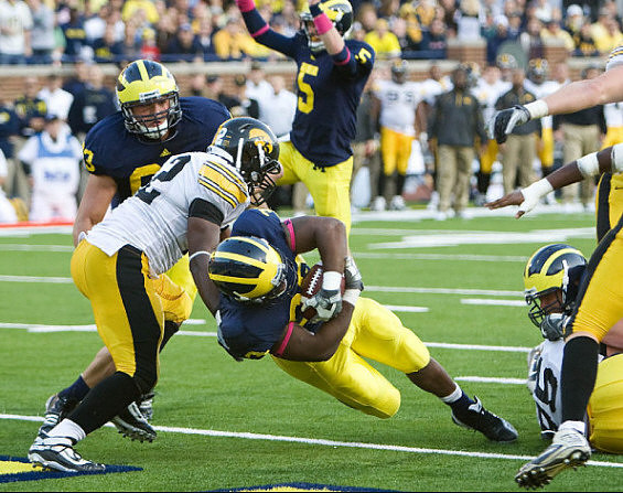 Rocko Khoury (63), Stephen Hopkins (33), and Tate Forcier (5)