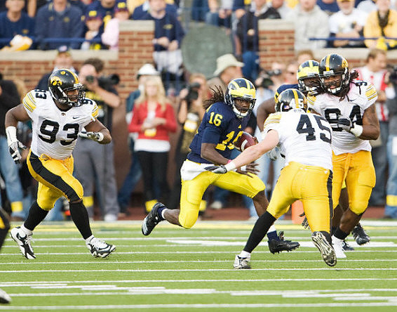 Denard Robinson (16) and Patrick Omameh (65)