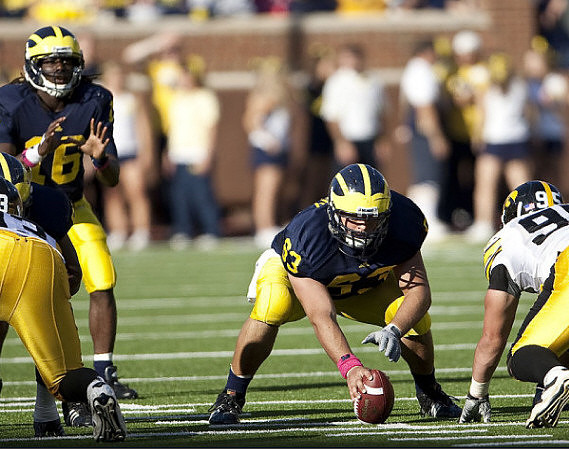 Denard Robinson (16) and Rocko Khoury (63)