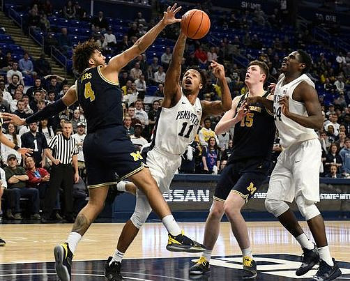 Isaiah Livers (4) and Jon Teske (15)