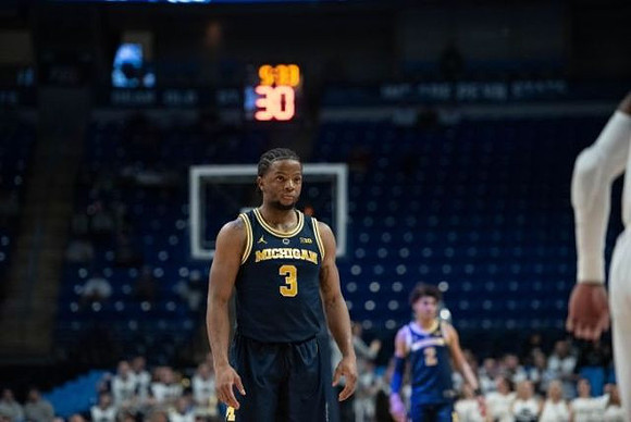 Zavier Simpson (3) and Jordan Poole (2)