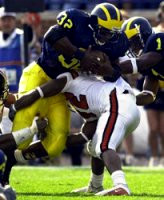 Anthony Thomas (32) and David Terrell (1)