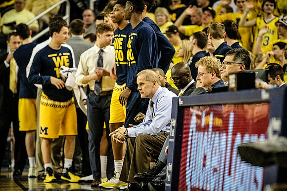 Andrew Dakich (11), Kameron Chatman (3), Caris LeVert (23), John Beilein, and Bacari Alexander
