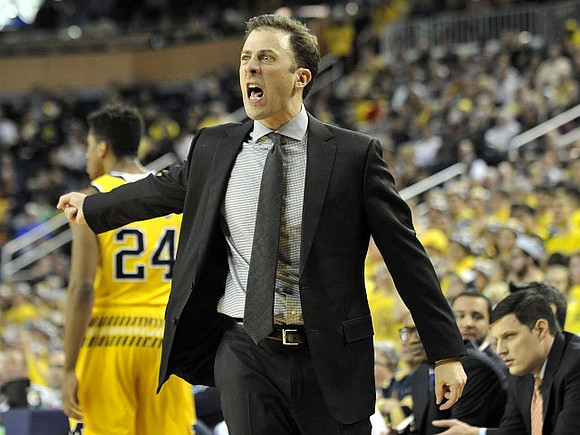 Aubrey Dawkins (24) and Minnesota Head Coach Richard Pitino