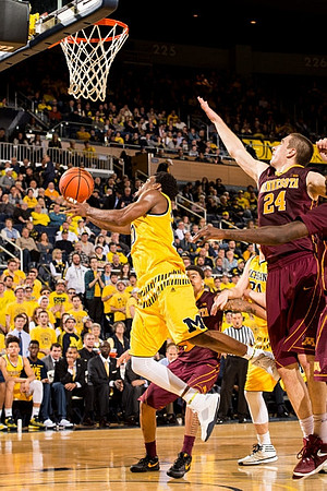 Derrick Walton Jr. (10) and Mark Donnal (34)