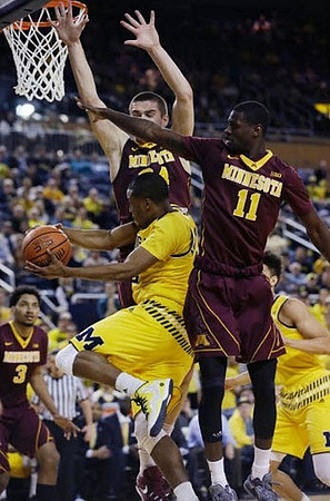 Muhammad-Ali Abdur-Rahkman (12) and D.J. Wilson (5)
