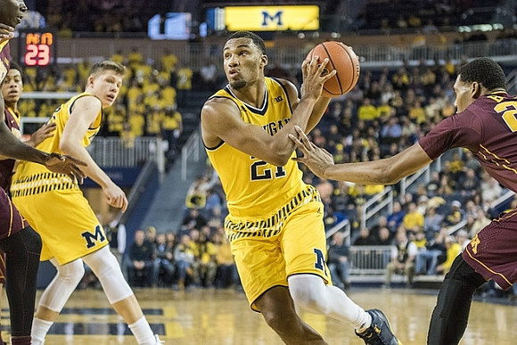 Moritz Wagner (13) and Zak Irvin (21)