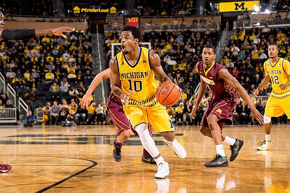 Derrick Walton Jr. (10) and Muhammad-Ali Abdur-Rahkman (12)