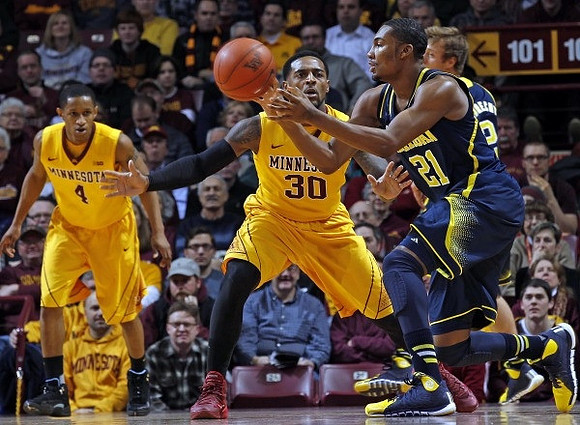 Zak Irvin (21) and Spike Albrecht (2)