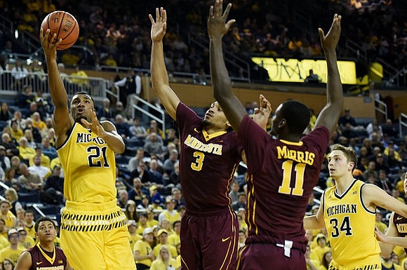 Zak Irvin (21) and Mark Donnal (34)