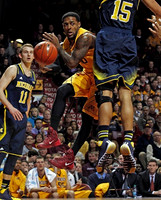 Nik Stauskas (11) and Jon Horford (15)