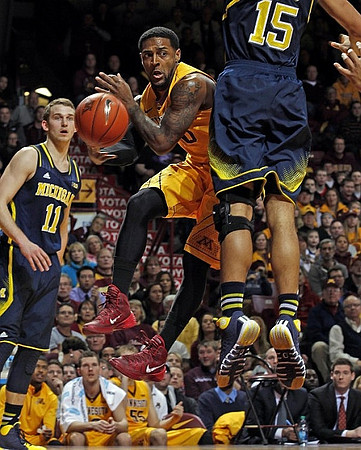 Nik Stauskas (11) and Jon Horford (15)