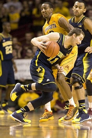 Caris LeVert (23), Nik Stauskas (11), and Jon Horford (15)