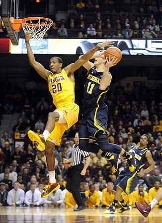 Nik Stauskas (11) and Derrick Walton Jr. (10)