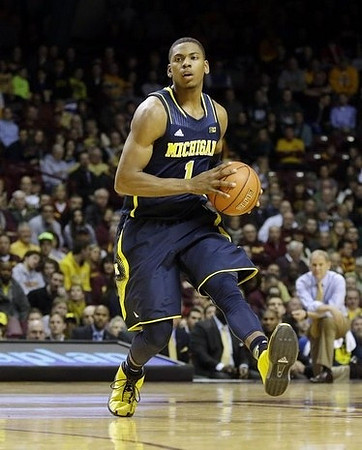 Glenn Robinson III (1) and John Beilein