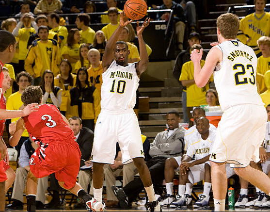 Tim Hardaway Jr. (10) and Evan Smotrycz (23)