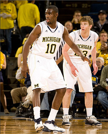 Tim Hardaway Jr. (10) and Evan Smotrycz (23)