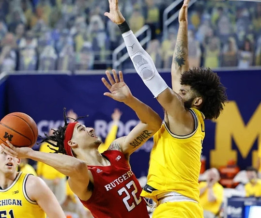 Austin Davis (51) and Isaiah Livers (2)