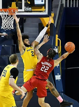 Austin Davis (51) and Isaiah Livers (2)