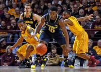 Nik Stauskas (11) and Derrick Walton Jr. (10)