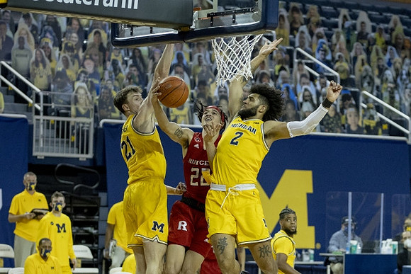 Franz Wagner (21), Isaiah Livers (2), and Mike Smith (12)