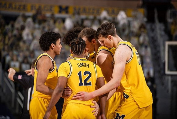 Eli Brooks (55), Mike Smith (12), Isaiah Livers (2), Austin Davis (51), and Franz Wagner (21)
