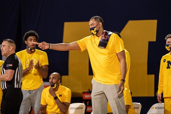 Jace Howard (25), Saddi Washington, Juwan Howard, and Luke Wilson (32)