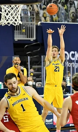 Franz Wagner (21), Juwan Howard, and Hunter Dickinson (1)