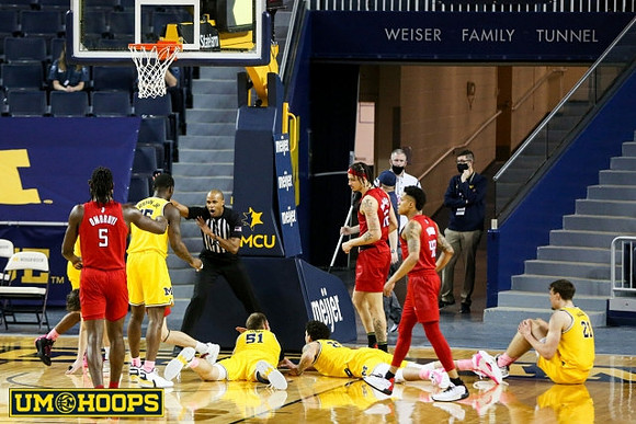 Chaundee Brown Jr. (15), Austin Davis (51), Eli Brooks (55), and Franz Wagner (21)