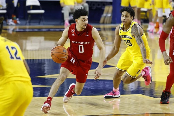 Mike Smith (12) and Chaundee Brown Jr. (15)