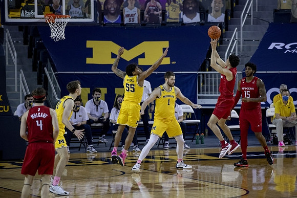 Franz Wagner (21), Eli Brooks (55), and Hunter Dickinson (1)