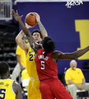 Brandon Johns Jr. (23) and Chaundee Brown Jr. (15)