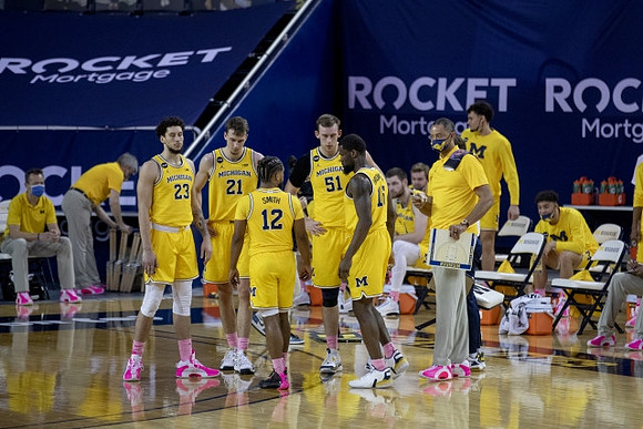 Brandon Johns Jr. (23), Franz Wagner (21), Mike Smith (12), Austin Davis (51), Chaundee Brown Jr. (15), and Juwan Howard