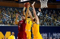 Isaiah Livers (2), Hunter Dickinson (1), and Juwan Howard